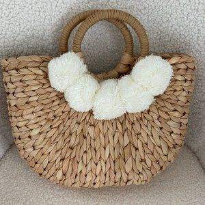 Hand-Woven Straw Bag with Pom Poms